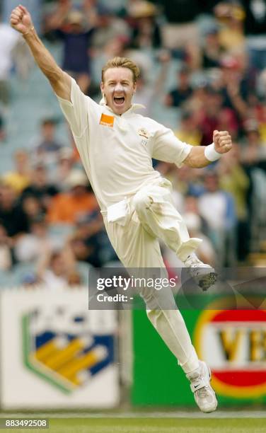 Australian fast bowler Andy Bichel leaps for joy after dismissing South African batsmna Lance Klusener for a golden duck on the second day of the...