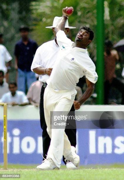 Sri Lankan bowler Muttiah Muralidharan delivers a ball during the final day of the first cricket test match between Sri Lanka and West Indies 17...
