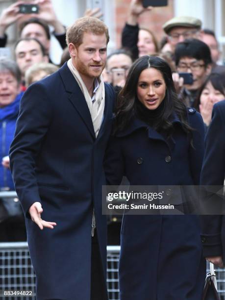 Prince Harry and fiancée Meghan Markle attend the Terrance Higgins Trust World AIDS Day charity fair at Nottingham Contemporary on December 1, 2017...