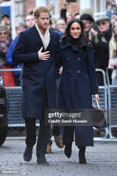 Prince Harry and fiancée Meghan Markle attend the Terrance Higgins Trust World AIDS Day charity fair at Nottingham Contemporary on December 1, 2017...