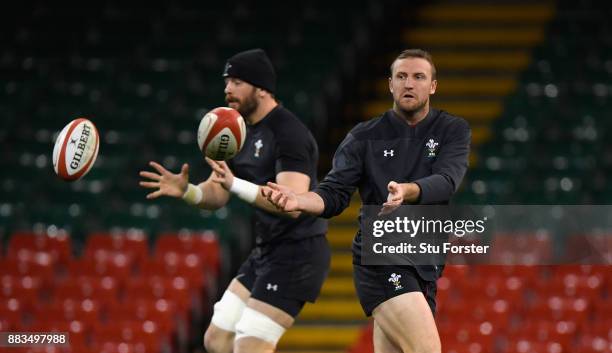 Wales captain Alun Wyn Jones and Hadleigh Parkes in action during Wales Captain's run ahead of their match against the South Africa Springboks at...