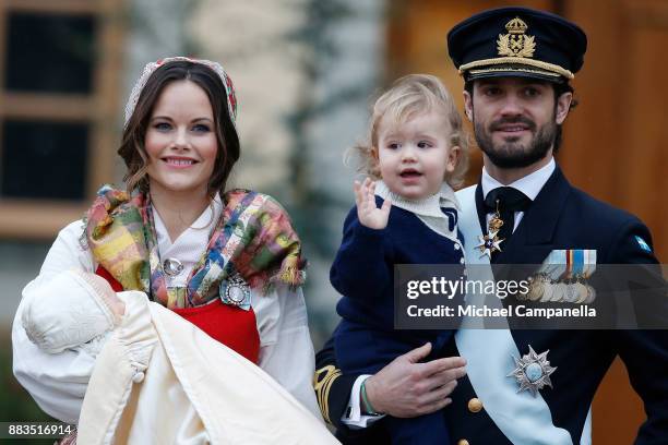 Prince Gabriel of Sweden, Duke of Dalarna held by Princess Sofia of Sweden and Prince Carl Philip holding Prince Alexander, Duke of Sodermanland is...