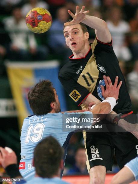 Handball Weltmeisterschaft 2007: Hauptrunde, Slowenien 35, Halle / Westfalen: Holger GLANDORF gegen Zoran LUBEJ