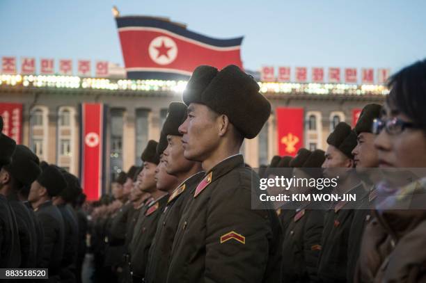 North Korean soldiers attend a mass rally to celebrate the North's declaration on November 29 it had achieved full nuclear statehood, on Kim Il-Sung...