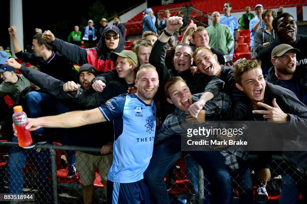 Jordy Buijs of Sydney FC celebrates with Sydney fans after the round nine A-League match between the Adelaide 36ers and the Sydney Kings at Coopers...