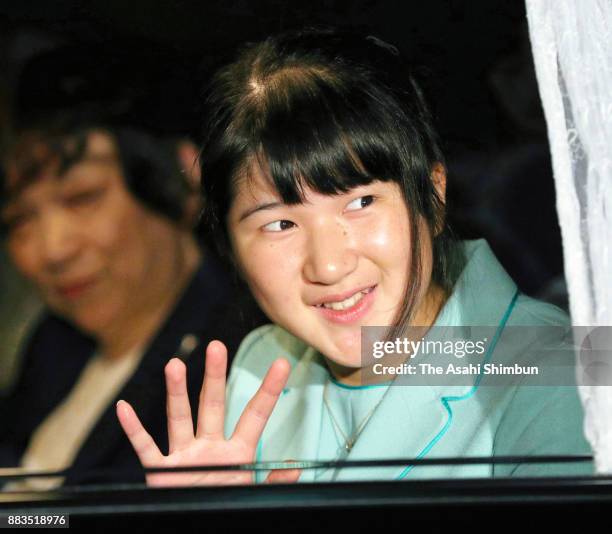 Princess Aiko waves on arrival at the Imperial Palace to meet Emperor and Empress on her 16th birthday on December 1, 2017 in Tokyo, Japan.