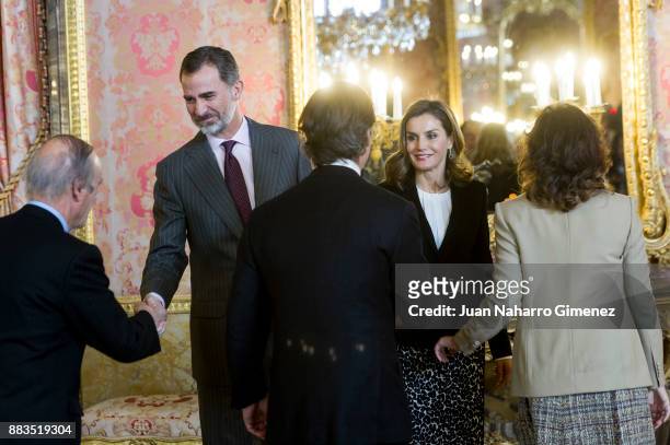 King Felipe VI of Spain and Queen Letizia of Spain attend a meeting with 'Princesa de Girona' Foundation members at the Royal Palace on December 1,...