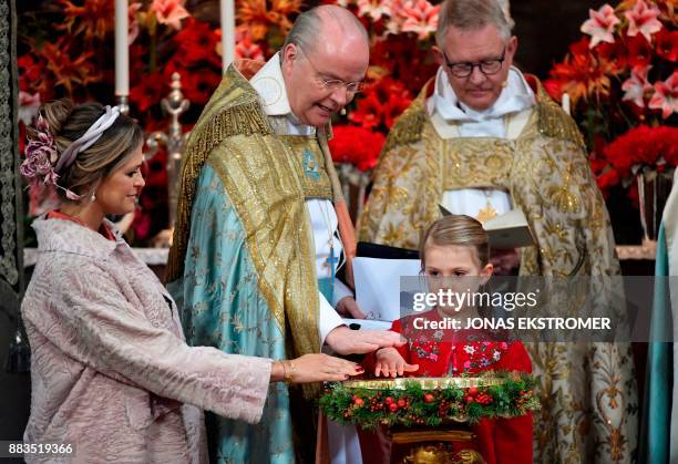 Princess Madeleine of Sweden, bishop Johan Dalman, princess Estelle and archbishop Anders Wejryd, attend baby Prince Gabriel's christening in...