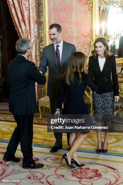 King Felipe VI of Spain and Queen Letizia of Spain attend a meeting with 'Princesa de Girona' Foundation members at the Royal Palace on December 1,...