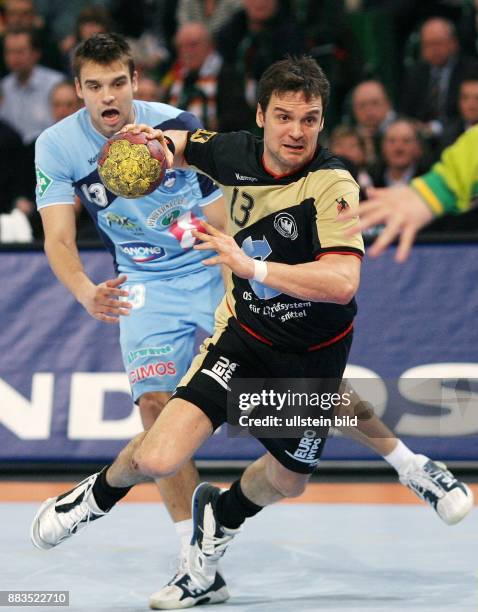 Handball Weltmeisterschaft 2007: Hauptrunde, Slowenien 35, Halle / Westfalen: Markus BAUR gegen Matjaz BRUMEN