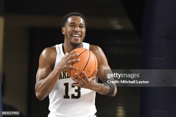 Bryant Crawford of the Wake Forest Demon Deacons with the ball during the quarterfinals of the Paradise Jam college basketball tournament against the...