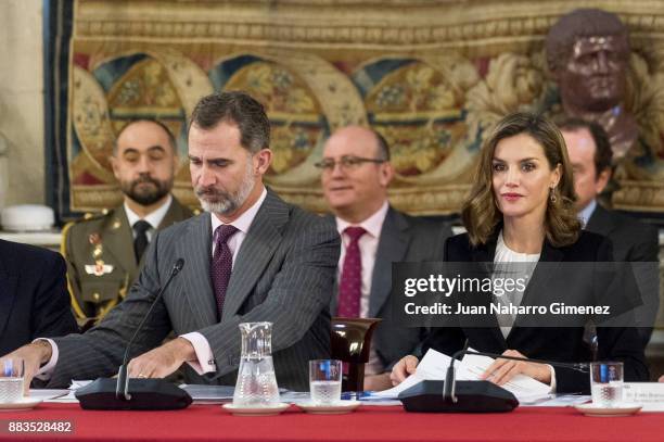 King Felipe VI of Spain and Queen Letizia of Spain attend a meeting with 'Princesa de Girona' Foundation members at the Royal Palace on December 1,...