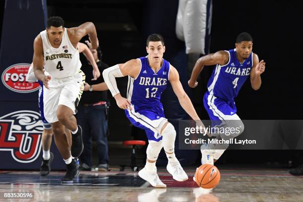 Reed Timmer of the Drake Bulldogs dribbles up court during the quarterfinals of the Paradise Jam college basketball tournament against the Wake...