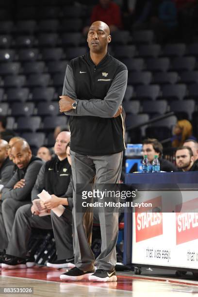 Head coach Danny Manning of the Wake Forest Demon Deacons looks onduring the quarterfinals of the Paradise Jam college basketball tournament against...