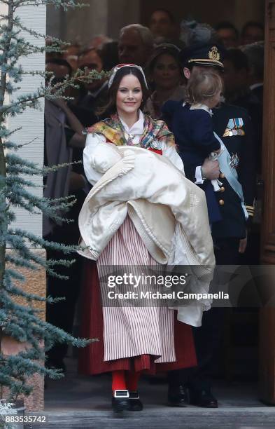 Prince Gabriel of Sweden, Duke of Dalarna held by Princess Sofia of Sweden leaves the chapel after the christening of Prince Gabriel of Sweden at...