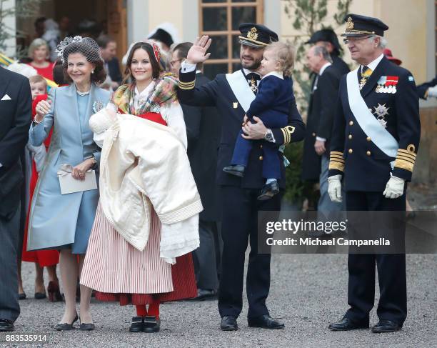 Queen Silvia of Sweden, Prince Gabriel of Sweden, Duke of Dalarna held by Princess Sofia of Sweden and Prince Carl Philip holding Prince Alexander,...