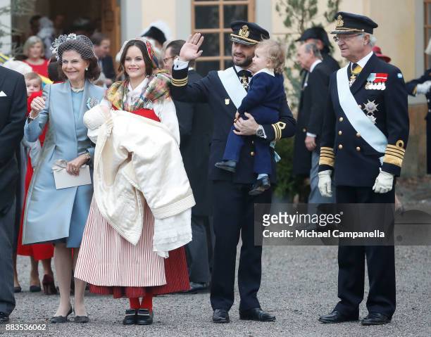 Queen Silvia of Sweden, Prince Gabriel of Sweden, Duke of Dalarna held by Princess Sofia of Sweden and Prince Carl Philip holding Prince Alexander,...