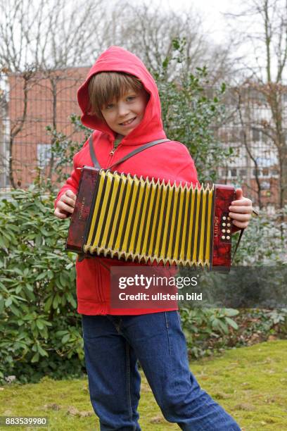 Boy playing bandoneon