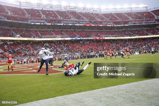 Louis Murphy of the San Francisco 49ers makes a 10-yard touchdown reception during the game against the Seattle Seahawks at Levi's Stadium on...