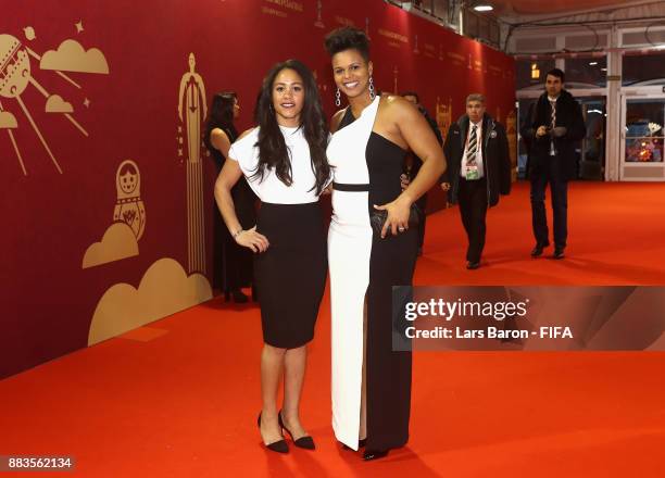 Former England footballer Alex Scott and former Canada footballer Karina LeBlanc arrive prior to the Final Draw for the 2018 FIFA World Cup Russia at...