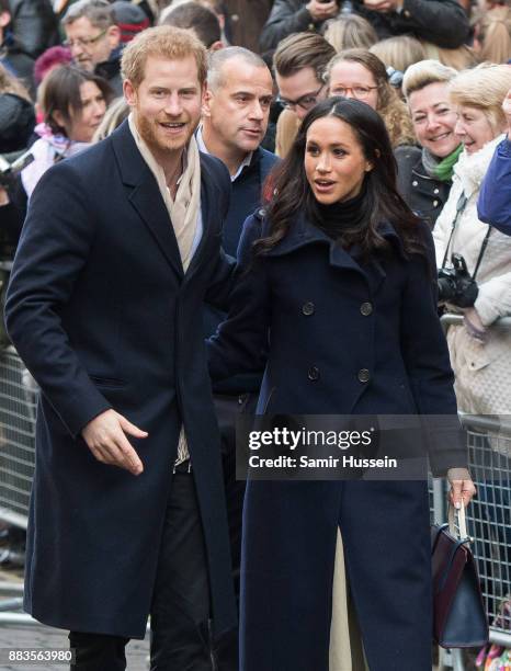 Prince Harry and Meghan Markle go on a walk about at Nottingham Contemporary on December 1, 2017 in Nottingham, England. Prince Harry and Meghan...