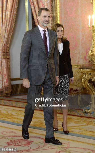 King Felipe VI of Spain and Queen Letizia of Spain attend a meeting with 'Princesa de Girona' Foundation members at the Royal Palace on December 1,...