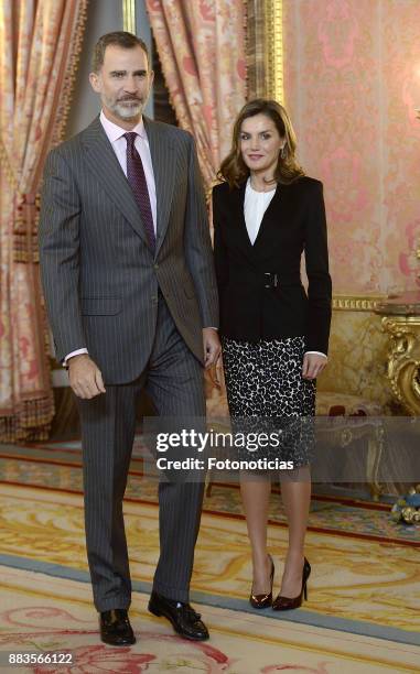 King Felipe VI of Spain and Queen Letizia of Spain attend a meeting with 'Princesa de Girona' Foundation members at the Royal Palace on December 1,...