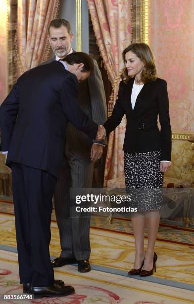 King Felipe VI of Spain and Queen Letizia of Spain attend a meeting with 'Princesa de Girona' Foundation members at the Royal Palace on December 1,...