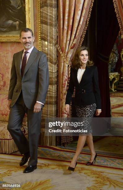 King Felipe VI of Spain and Queen Letizia of Spain attend a meeting with 'Princesa de Girona' Foundation members at the Royal Palace on December 1,...