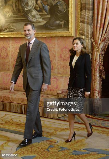 King Felipe VI of Spain and Queen Letizia of Spain attend a meeting with 'Princesa de Girona' Foundation members at the Royal Palace on December 1,...