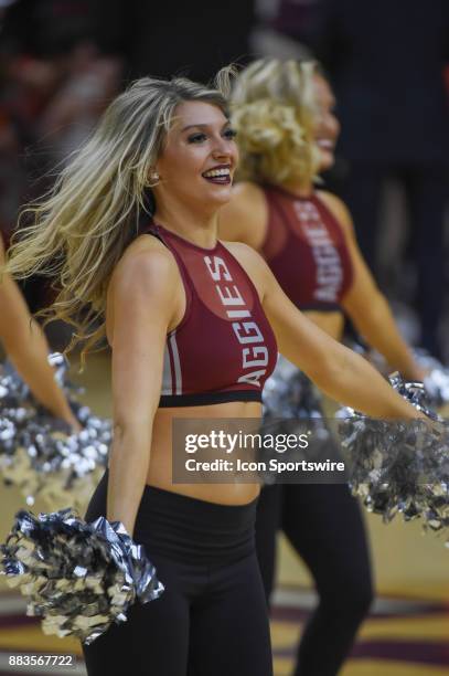 The Aggie dance team revs up the crowd during a second half timeout during the basketball game between the University of Texas - Rio Grande Vaqueros...