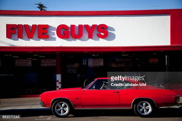 Chevrolet Chevelle SS396 in Pacific Beach, San Diego, in front of the fast-food-chain Five Guys.