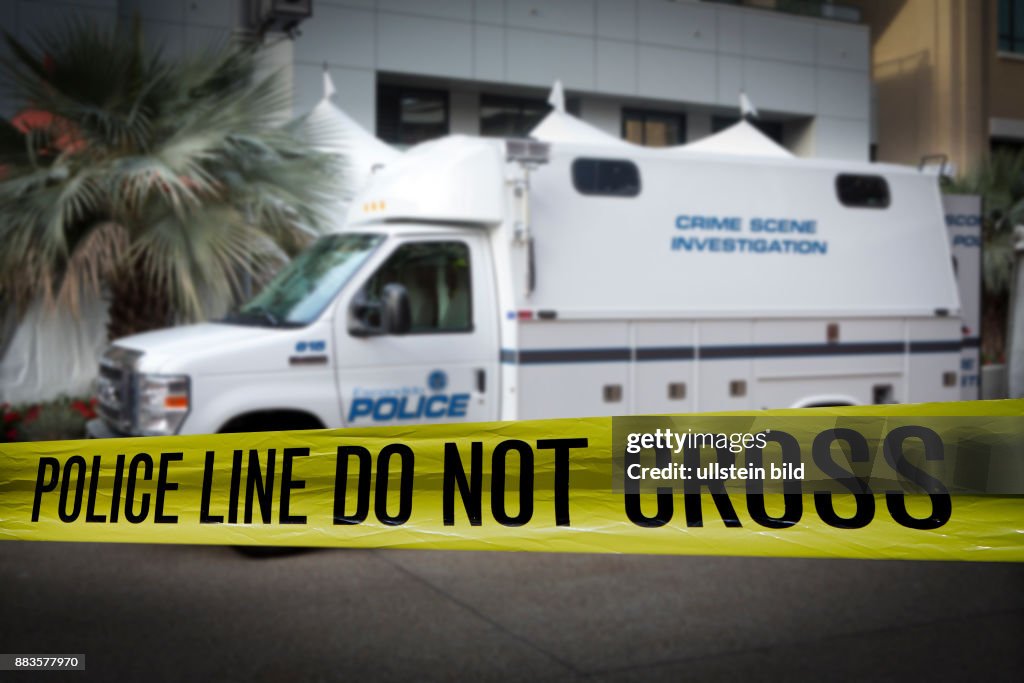 Crime Scene Investigation unit and police-tape