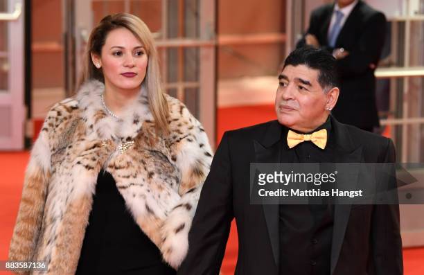 Draw assistant, Diego Maradona and his girlfriend Rocío Oliva arrives prior to the Final Draw for the 2018 FIFA World Cup Russia at the State Kremlin...