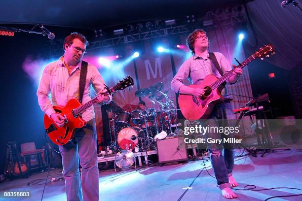 Musicians Ian Ball, Olly Peacock and Ben Ottewell of Gomez perform in concert at Stubb's Bar-B-Q on June 8, 2009 in Austin, Texas.