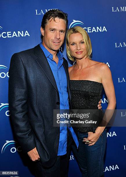Steve Pate and actress Nicollette Sheridan attend Oceana's celebration of World Oceans Day with La Mer at Private Residence on June 8, 2009 in Los...