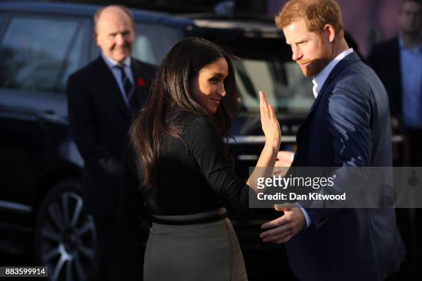Prince Harry and his fiancee, US actress Meghan Markle, depart Nottingham Academy as part of their first official public engagements together on...