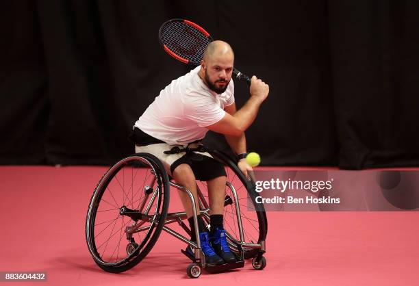 Stefan Olsson of Sweden in action during his match against Shingo Kunieda of Japan on day 3 of The NEC Wheelchair Tennis Masters at Loughborough...