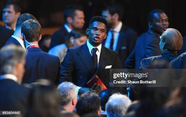 Samuel Eto'o makes his way to his seat during the Final Draw for the 2018 FIFA World Cup Russia at the State Kremlin Palace on December 1, 2017 in...