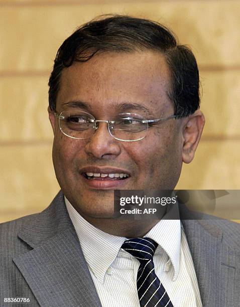 Bangladesh Foreign Affairs Minister Hasan Mahmud smiles during his meeting with Japanese Prime Minister Taro Aso at the latter's official residence...