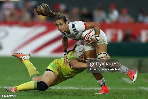 Ryan Carlyle of United States is tackled by Sharni Williams of Australia during the final match between Australia and United States on Day Two of the...