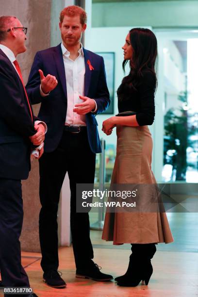 Prince Harry and his fiancee US actress Meghan Markle tour the Terrence Higgins Trust World AIDS Day charity fair at Nottingham Contemporary, as part...