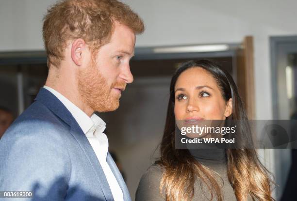 Prince Harry and his fiancee US actress Meghan Markle visit Nottingham Academy on December 1, 2017 in Nottingham, England. Prince Harry and Meghan...