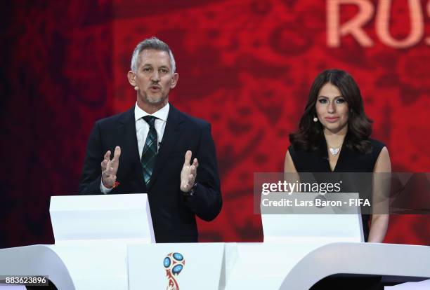 Presenter, Gary Lineker and Presenter, Maria Komandnaya speak to the audience during the Final Draw for the 2018 FIFA World Cup Russia at the State...