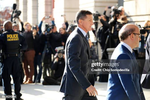 Michael Flynn, former national security advisor to President Donald Trump, arrives for his plea hearing at the Prettyman Federal Courthouse December...