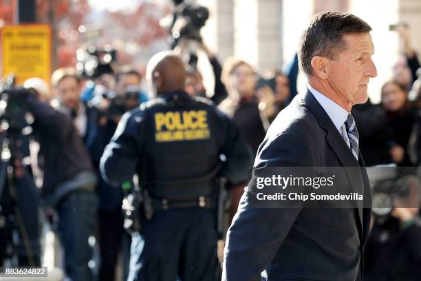 Michael Flynn, former national security advisor to President Donald Trump, arrives for his plea hearing at the Prettyman Federal Courthouse December...