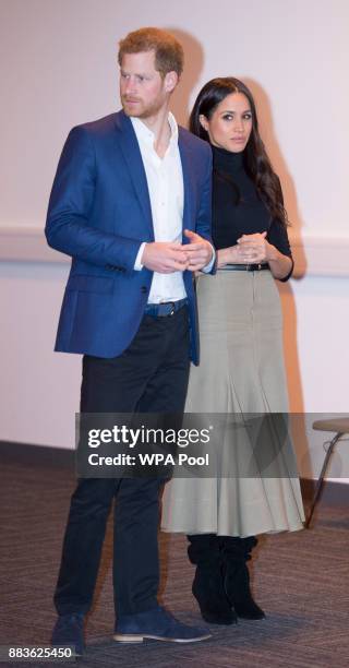 Prince Harry and his fiancee US actress Meghan Markle visit Nottingham Academy on December 1, 2017 in Nottingham, England. Prince Harry and Meghan...