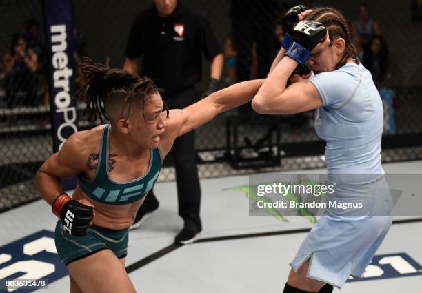 Sijara Eubanks punches Roxanne Modafferi during the filming of The Ultimate Fighter: A New World Champion at the UFC TUF Gym on August 18, 2017 in...