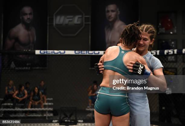 Sijara Eubanks hugs Roxanne Modafferi during the filming of The Ultimate Fighter: A New World Champion at the UFC TUF Gym on August 18, 2017 in Las...