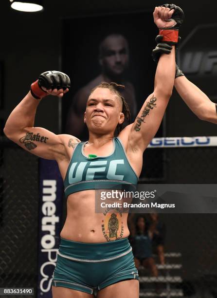 Sijara Eubanks celebrates her victory over Roxanne Modafferi during the filming of The Ultimate Fighter: A New World Champion at the UFC TUF Gym on...
